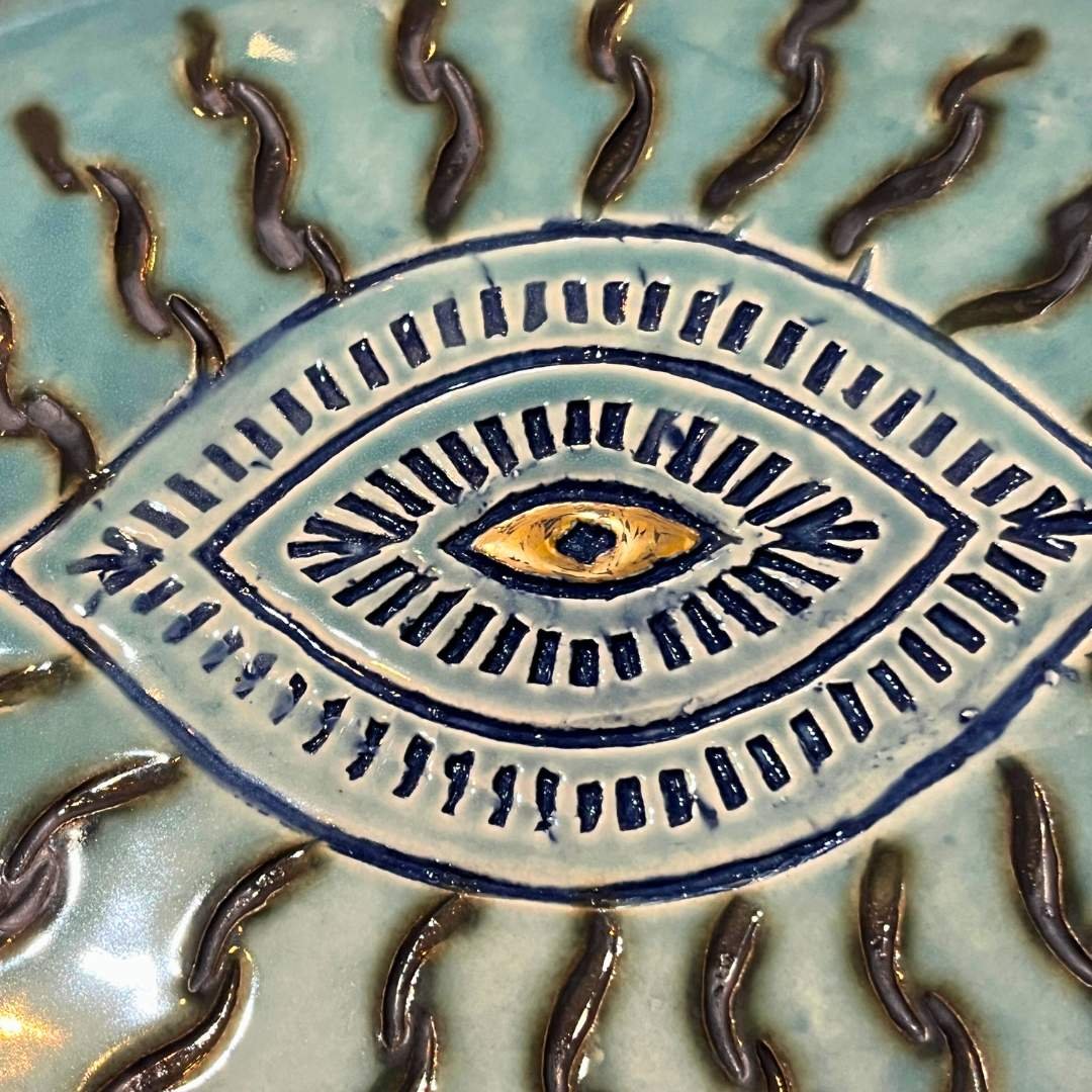 Handcrafted Ceramic Green Plate with Eye Detail by Jane Tyler