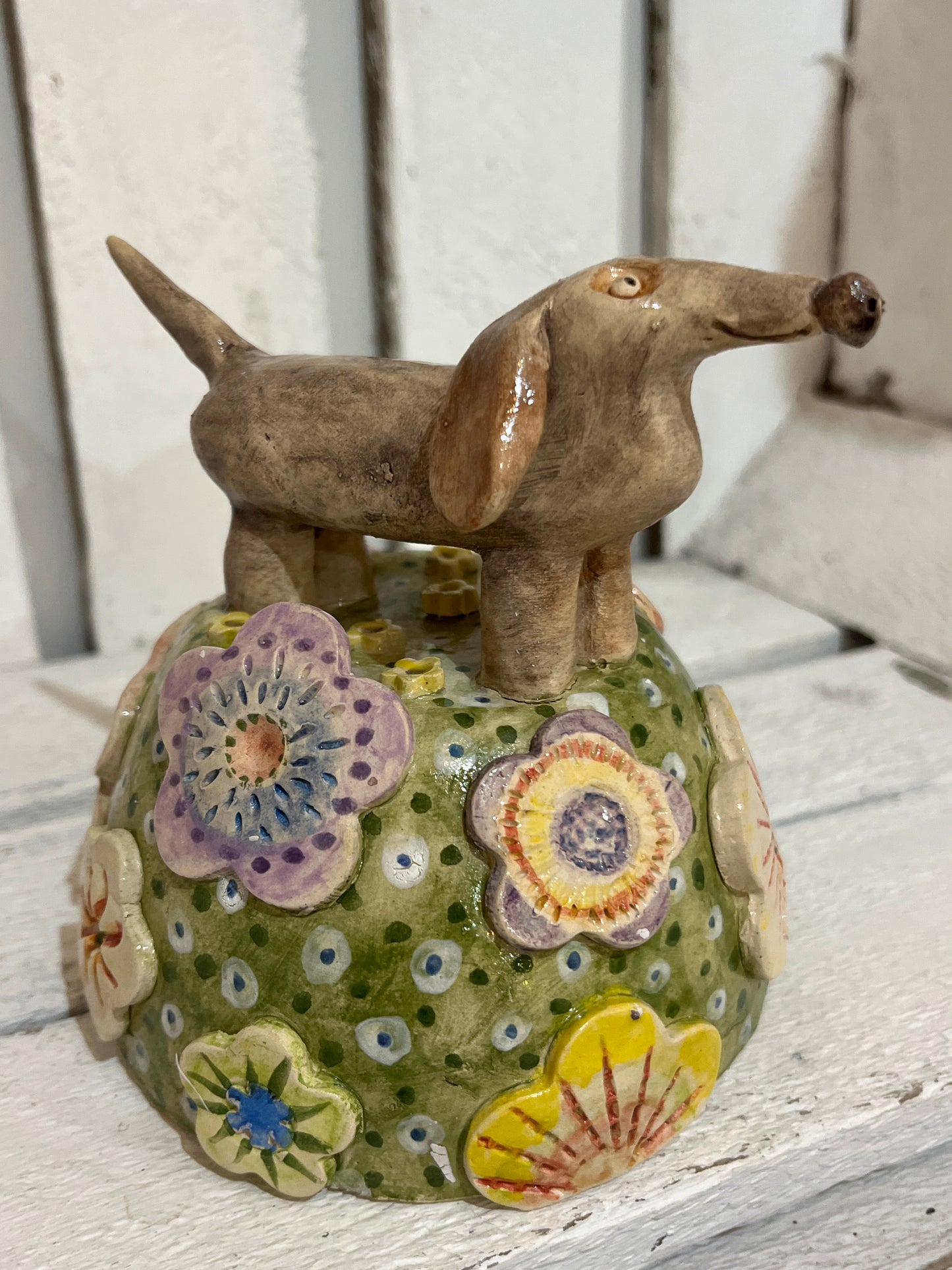 Sausage Dog on Flowery Knoll by Judith Douglas