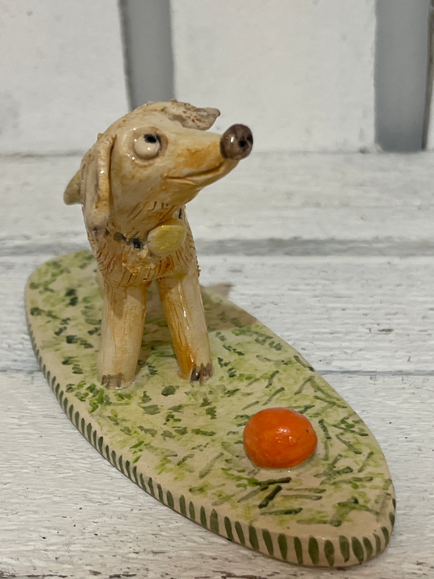Dog with Orange Ball by Judith Douglas
