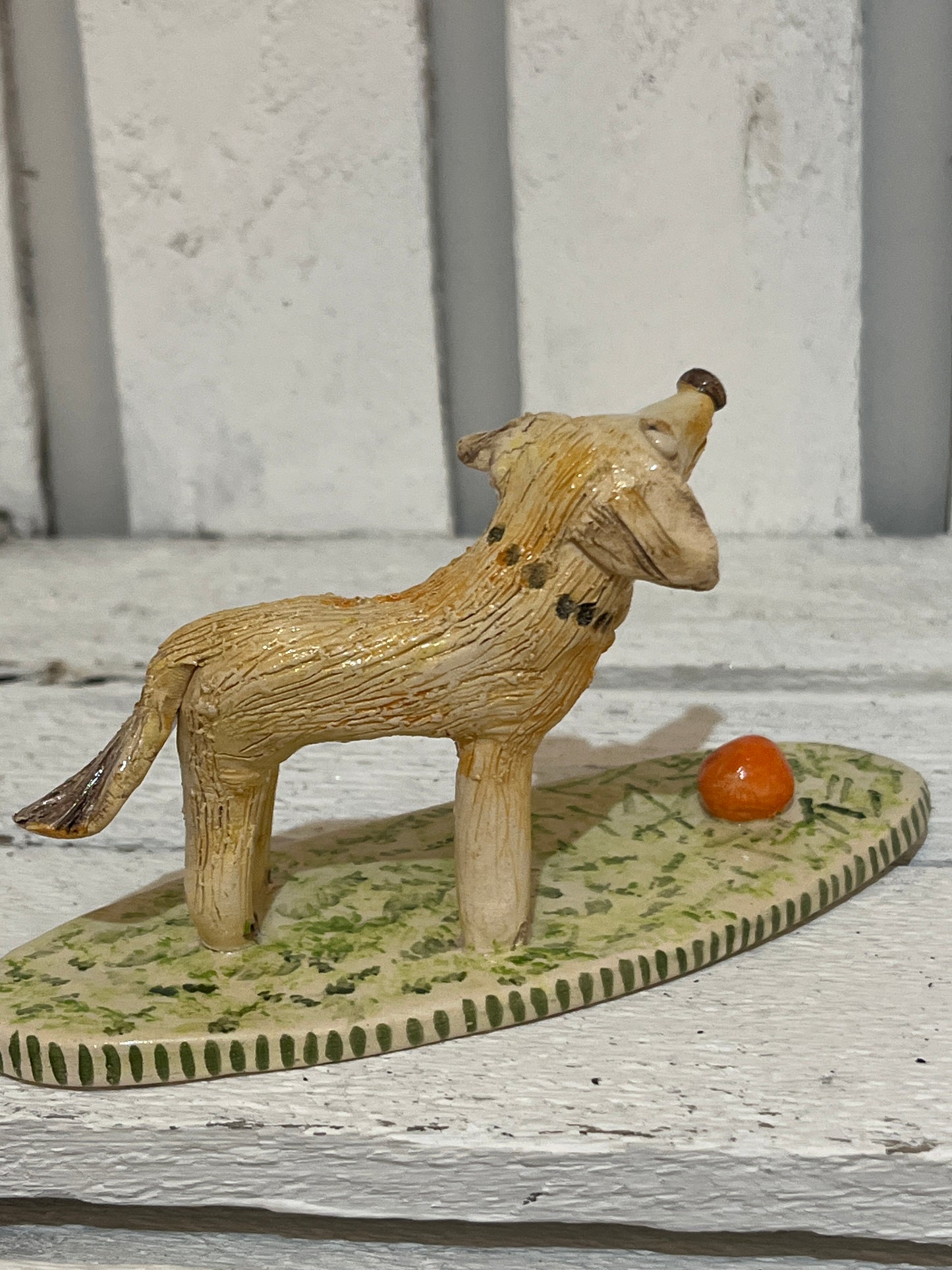 Dog with Orange Ball by Judith Douglas