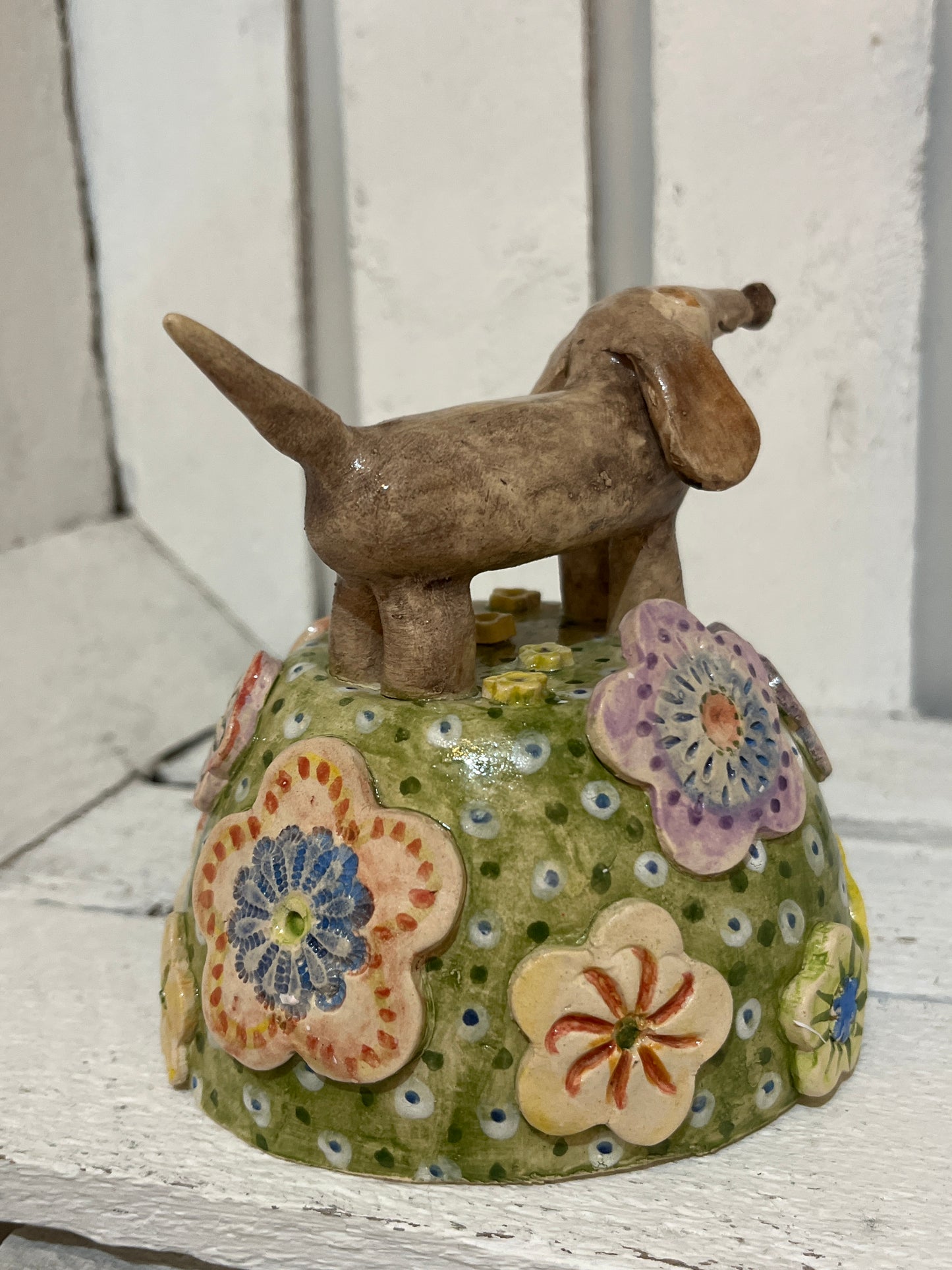 Sausage Dog on Flowery Knoll by Judith Douglas