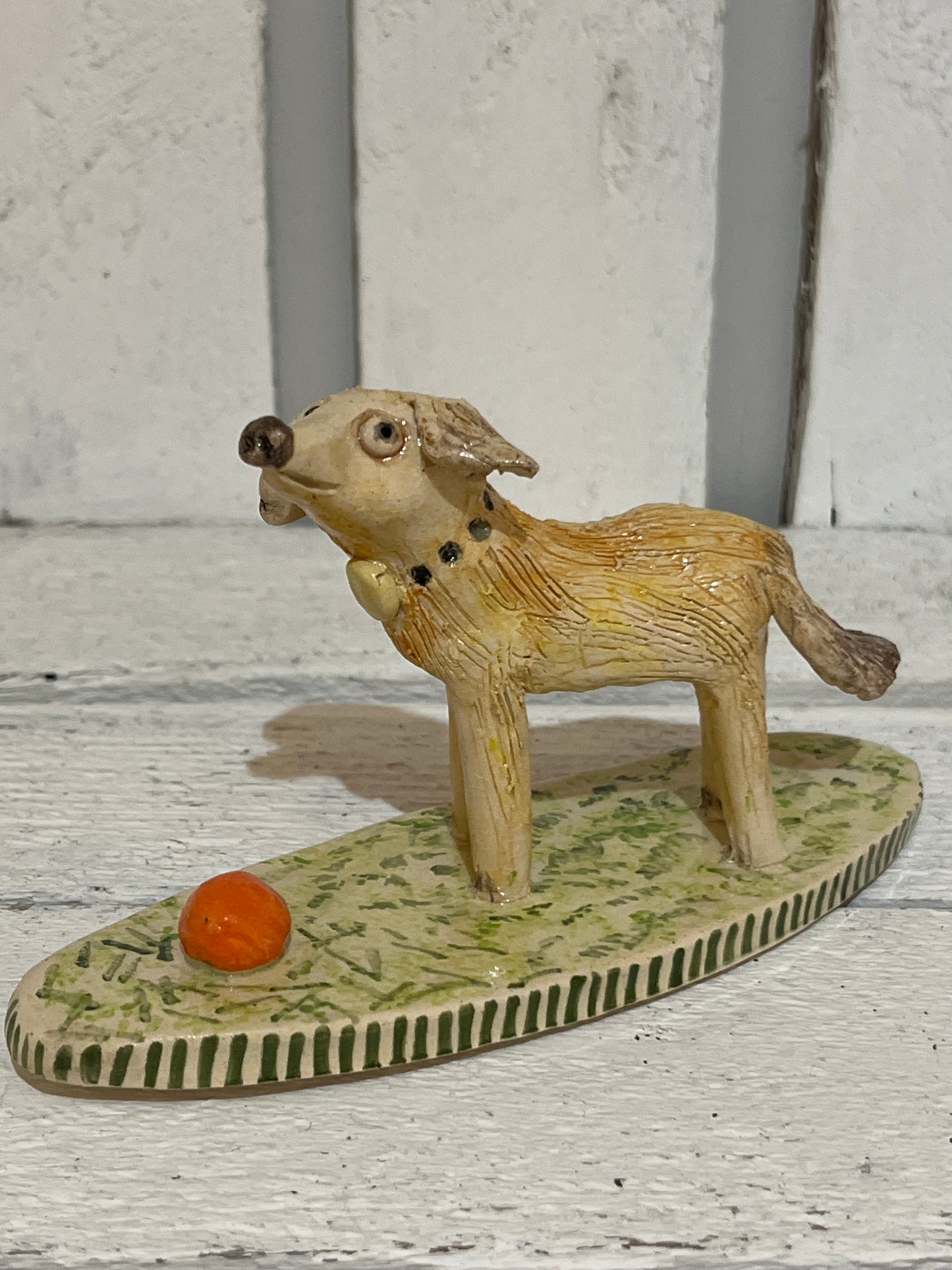 Dog with Orange Ball by Judith Douglas