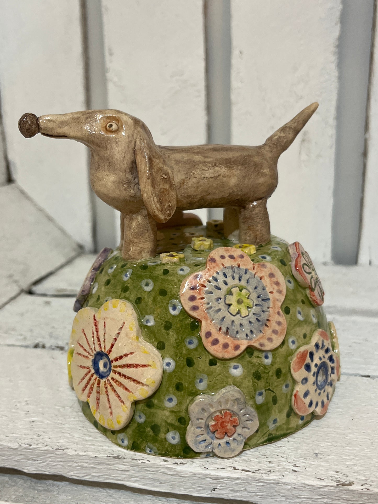 Sausage Dog on Flowery Knoll by Judith Douglas