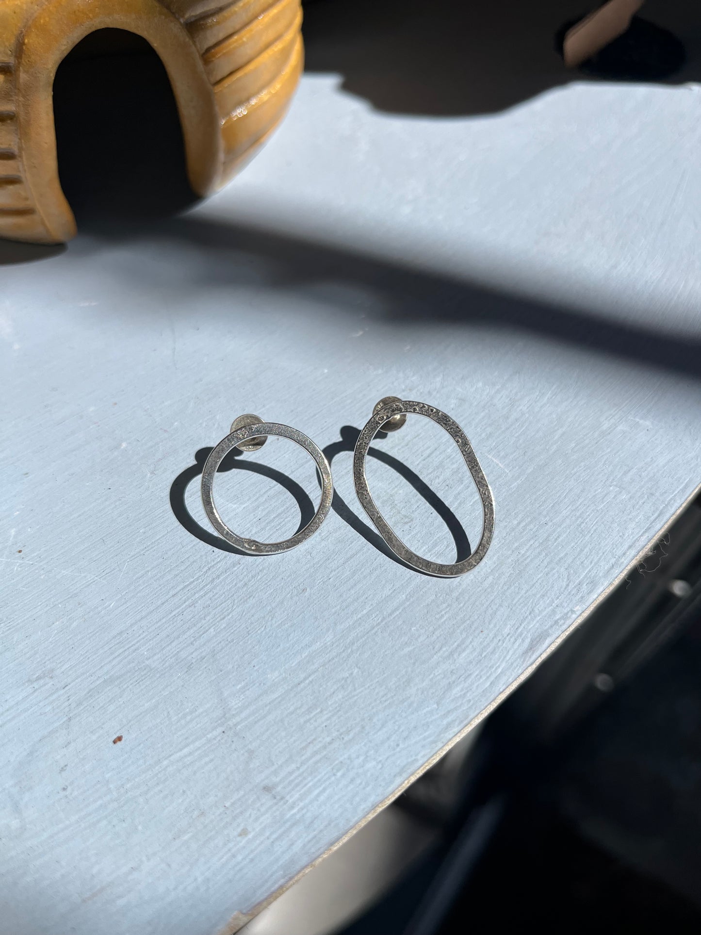 Asymmetric Silver Circle earrings