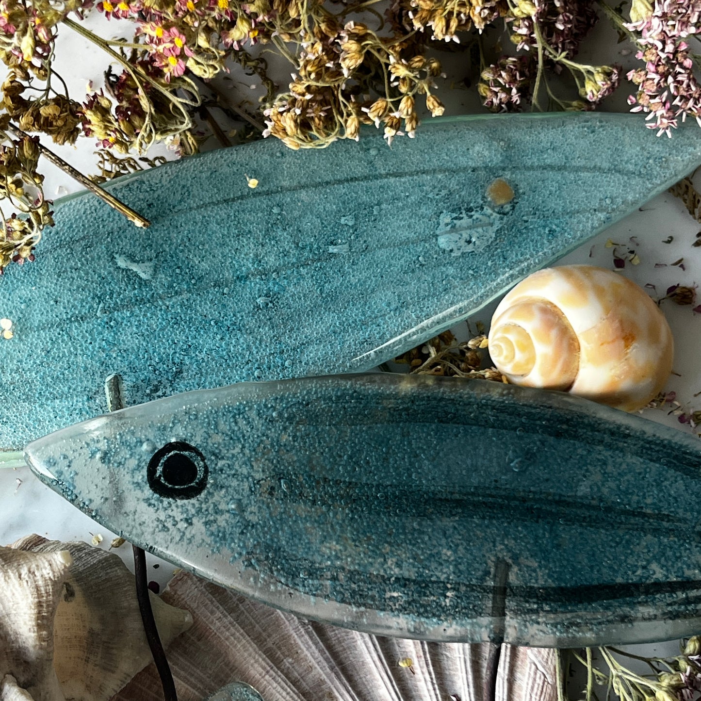Large Fish on Cane