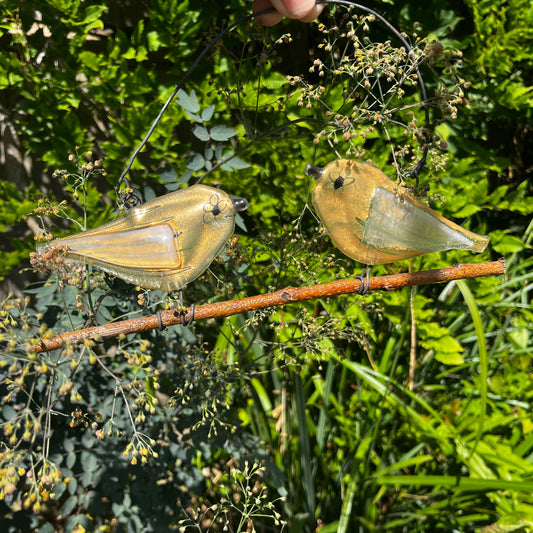 Two Glass Birds on a Branch