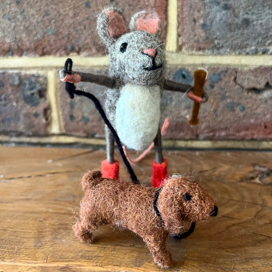Mouse walking a Dachshund