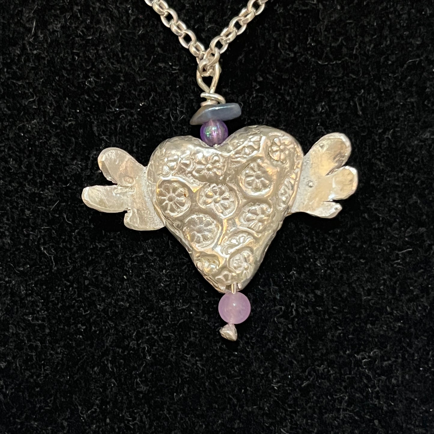 Winged heart necklace