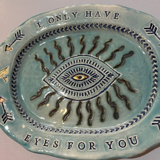 Handcrafted Ceramic Green Plate with Eye Detail by Jane Tyler